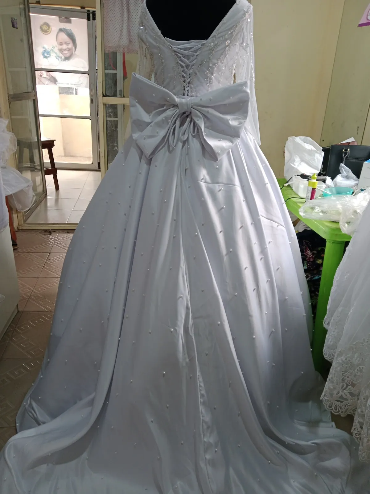 Satin ball gown with bow back