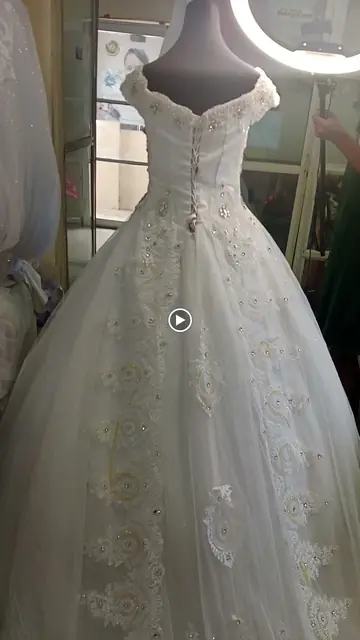 Close-up of a beaded lace ball gown