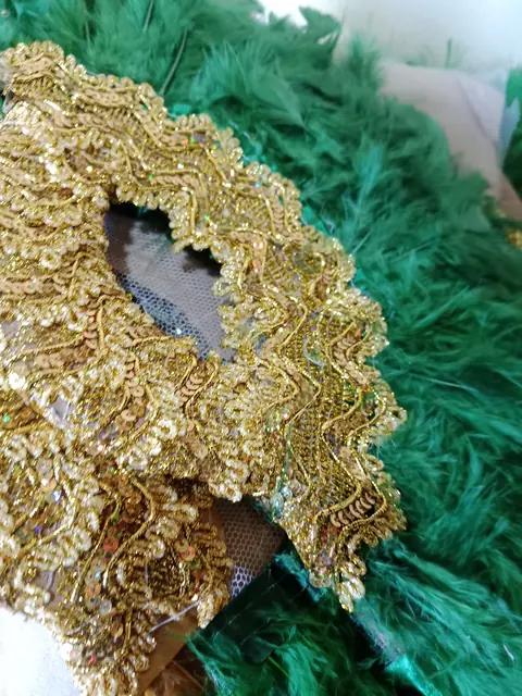 Emerald and gold feather hand fan