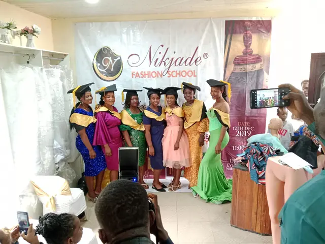 Graduating class in front of the Nikjade backdrop