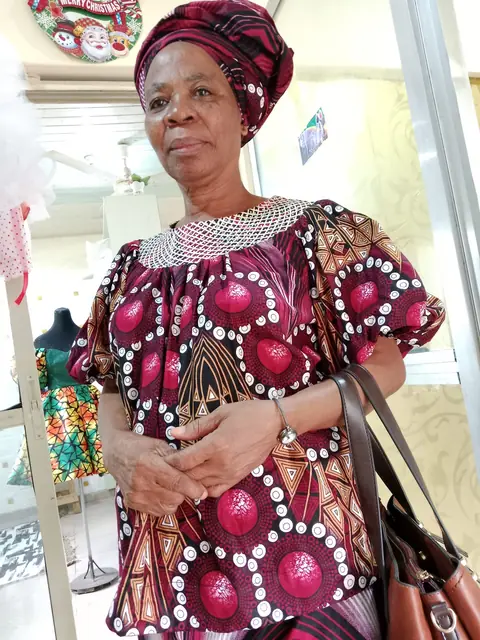 Client in a beaded Ankara outfit