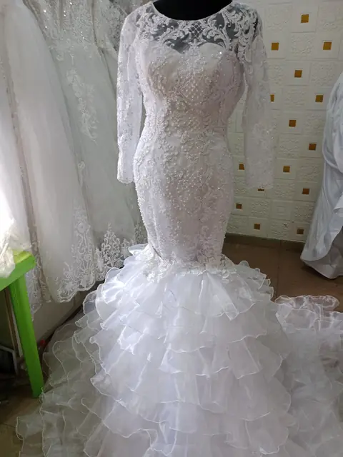 Lace mermaid gown with ruffled skirt