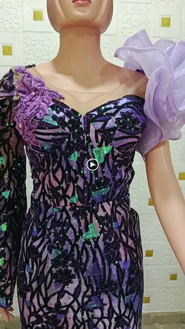 Bespoke sequinned lace gown with organza sleeve